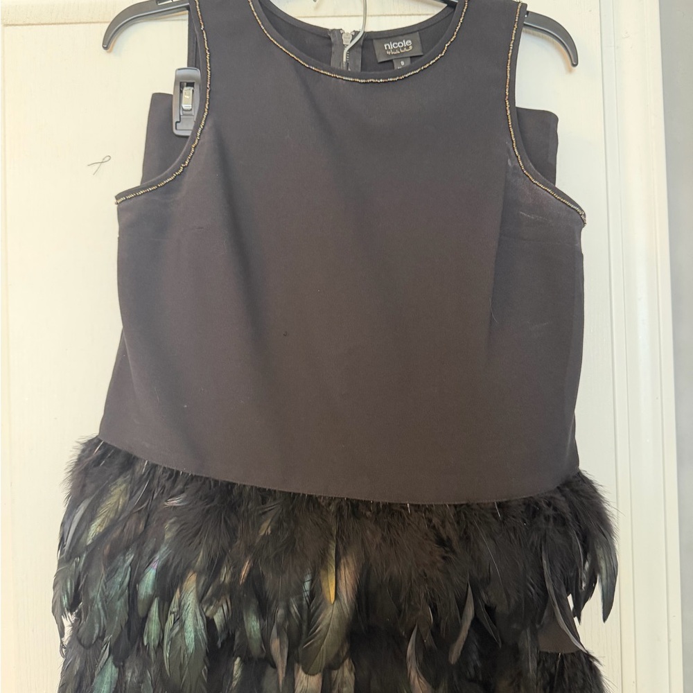 Nicole Miller Black suit with feather trim